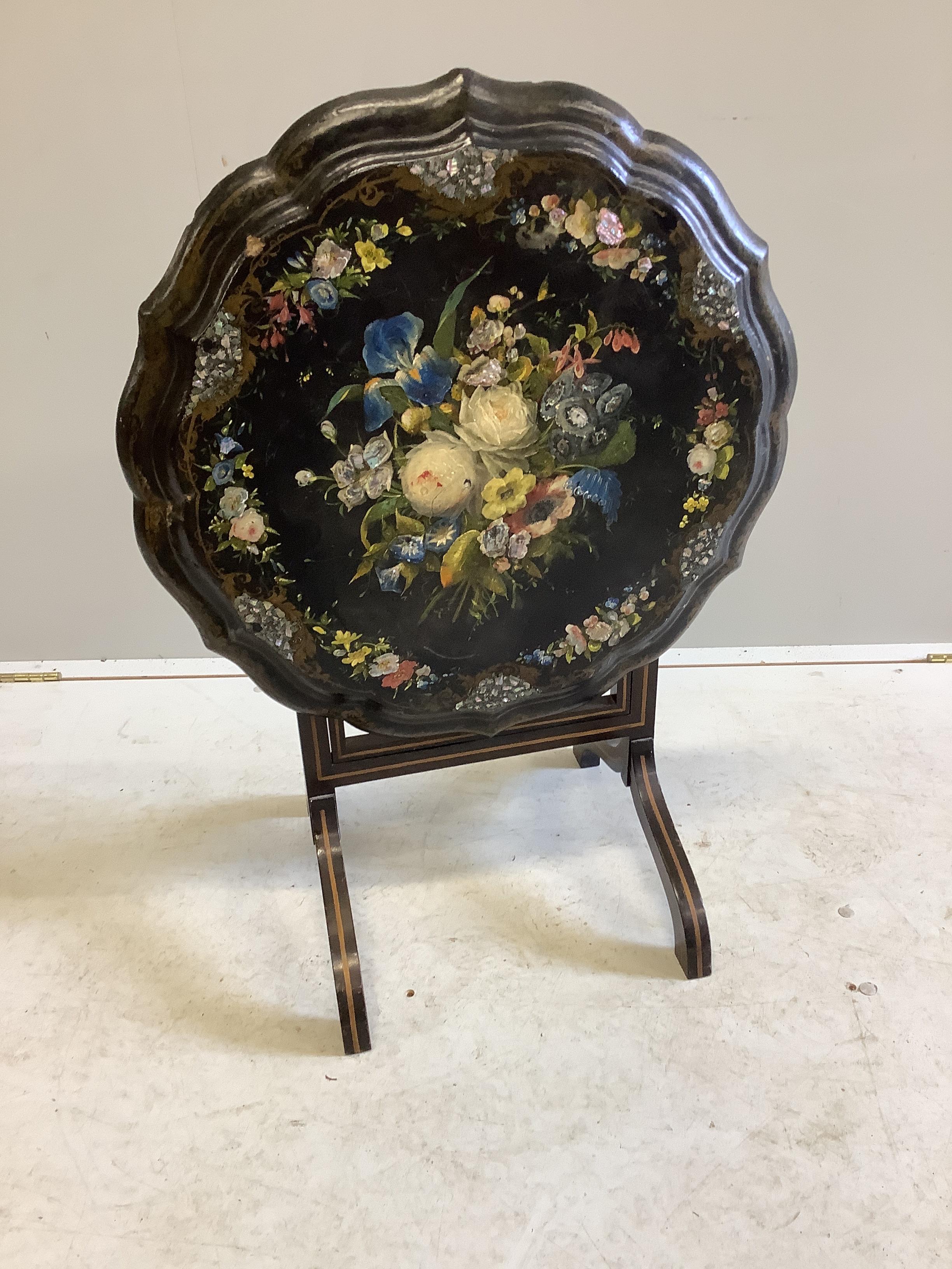 A Victorian painted and papier mache circular tilt top occasional table, diameter 59cm, height 58cm